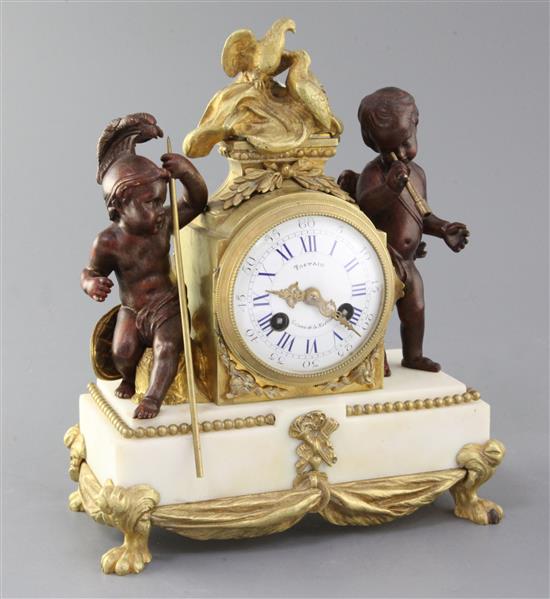 A 19th century French bronze and ormolu mounted white marble mantel clock, 10in.